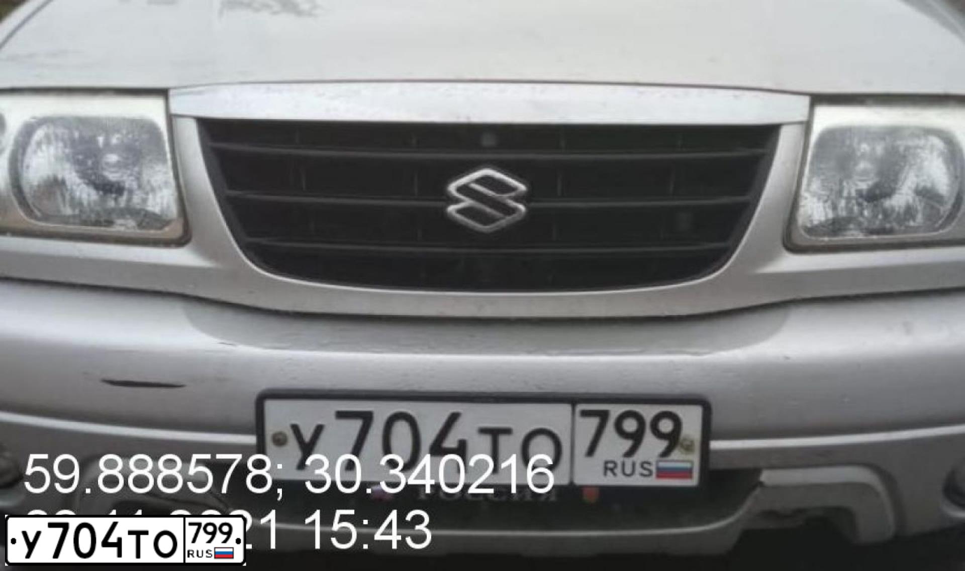 Фото автомобиля SUZUKI /GRAND/ VITARA, 2004 — госномер У704ТО799. Цвет: СЕРЫЙ