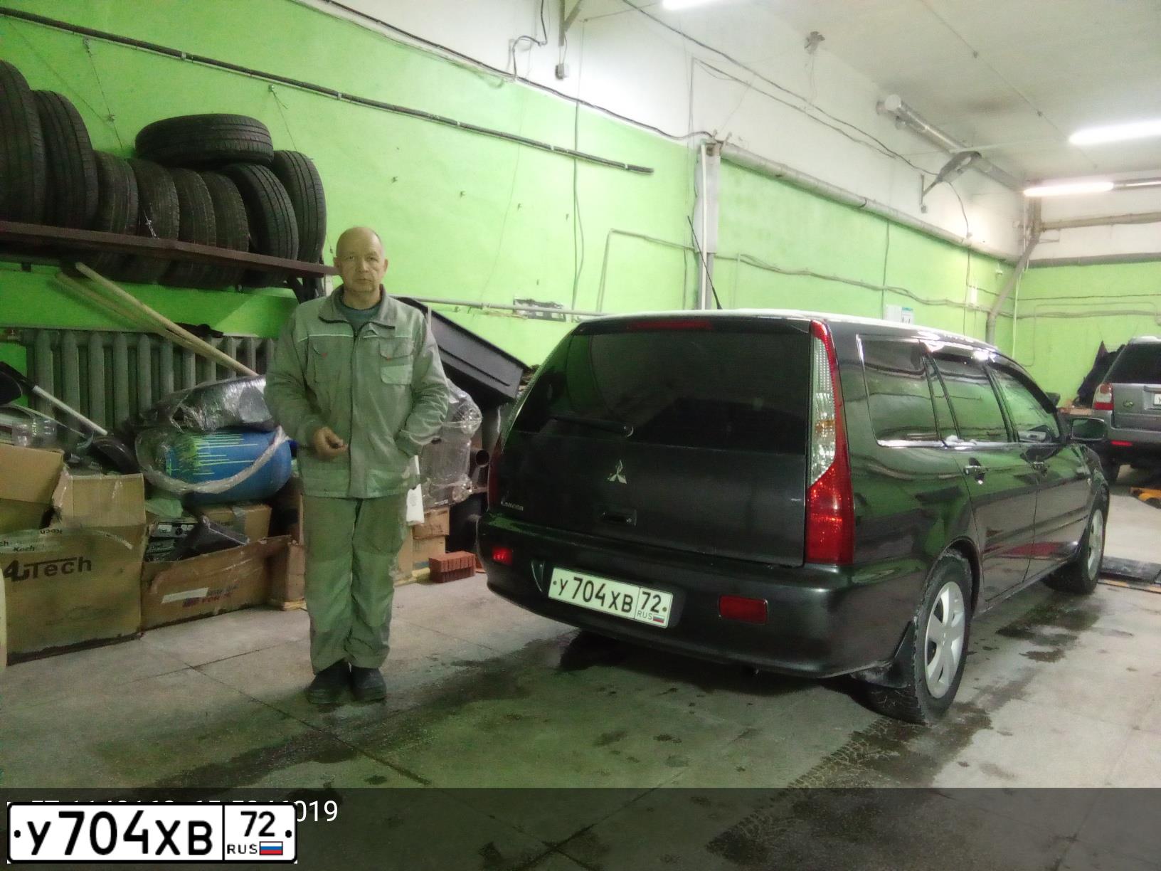 Фото автомобиля MITSUBISHI LANCER, 2003 — госномер А911АХ172. Цвет: СЕРЫЙ