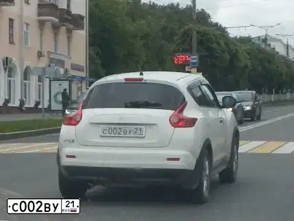 Фото автомобиля NISSAN JUKE, 2012 — госномер С002ВУ21. Цвет: Белый