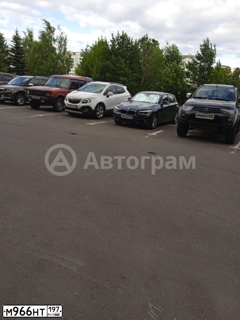 Фото автомобиля MITSUBISHI L 200, 2011 — госномер М966НТ197. Цвет: ЧЕРНЫЙ