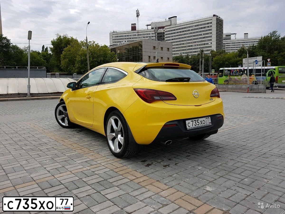Фото автомобиля OPEL ASTRA, 2013 — госномер В474КК57. Цвет: ЖЁЛТЫЙ