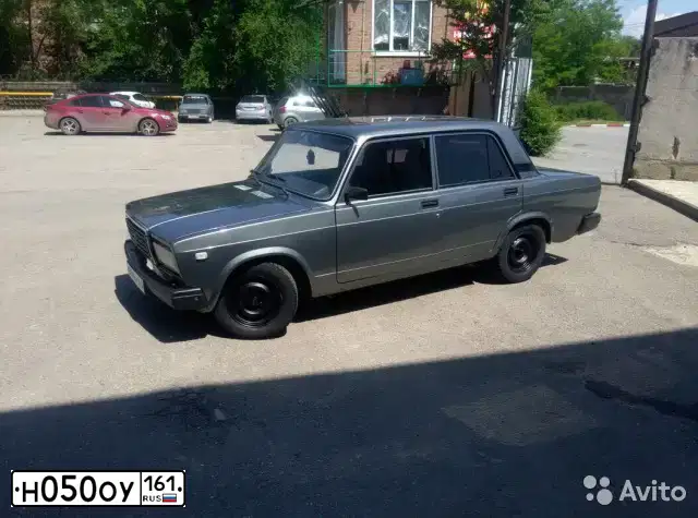 Фото автомобиля TOYOTA ECHO, 1999 — госномер Н050ОУ61. Цвет: СЕРО-ЗОЛОТИСТЫЙ