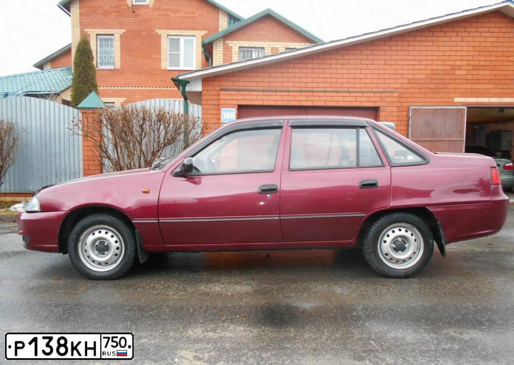Фото автомобиля DAEWOO NEXIA, 2014 — госномер С024АВ184. Цвет: Красный