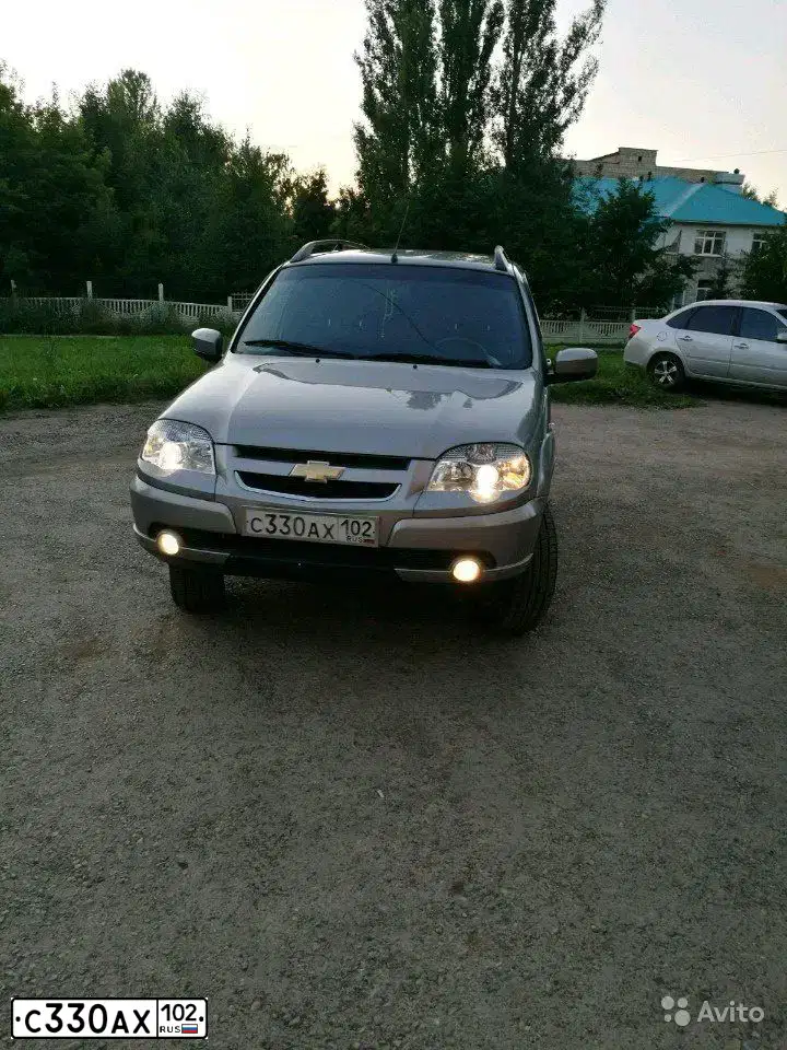 Фото автомобиля CHEVROLET NIVA, 2014 — госномер Х920ВХ102. Цвет: СЕРО-КОРИЧНЕВЫЙ МЕТАЛЛИК