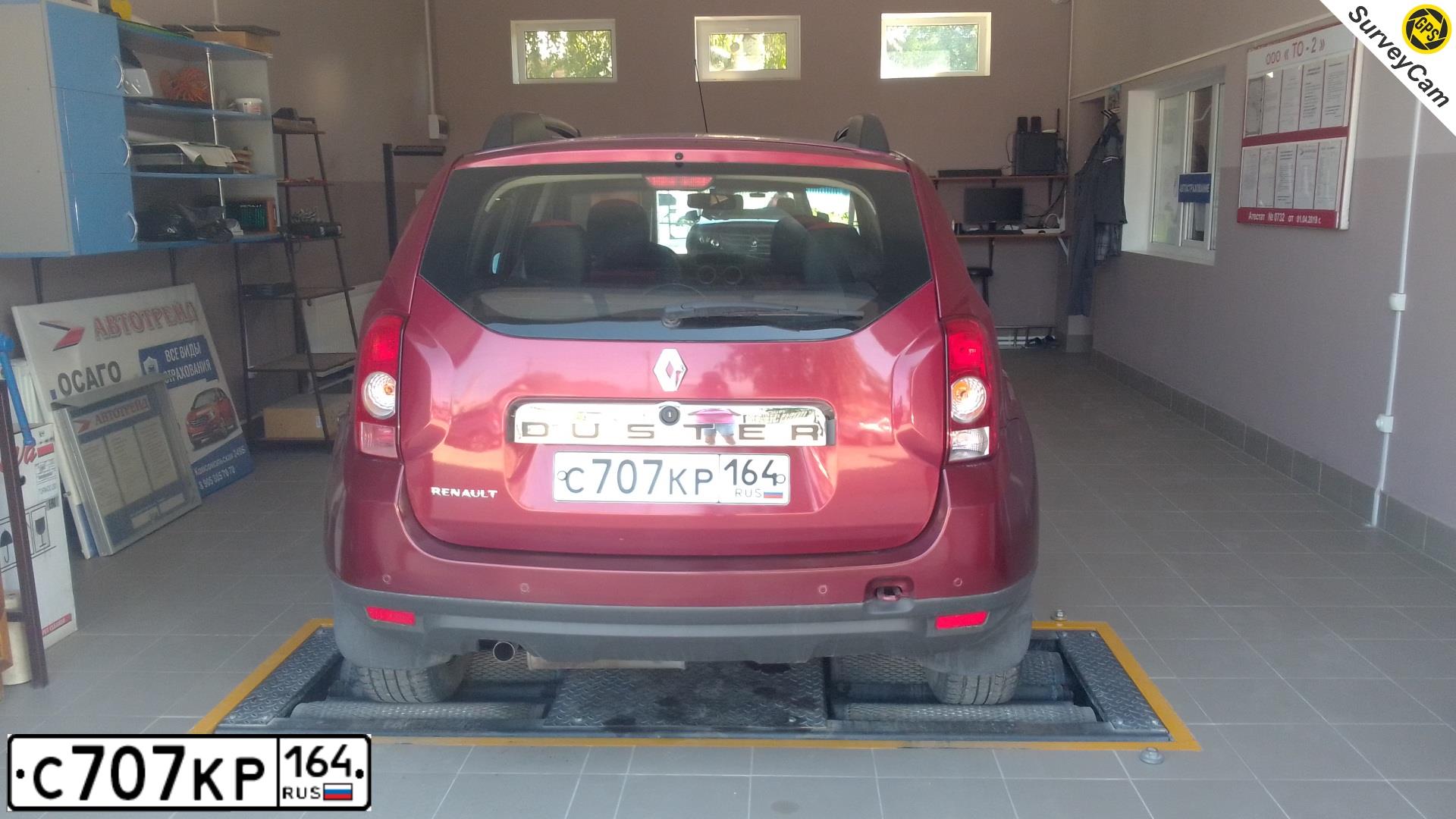 Фото автомобиля RENAULT DUSTER, 2012 — госномер В064ОХ64. Цвет: КРАСНЫЙ