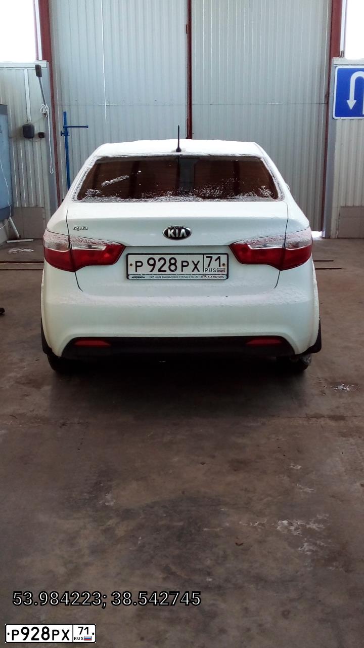 Фото автомобиля KIA RIO, 2014 — госномер Р928РХ71. Цвет: БЕЛЫЙ