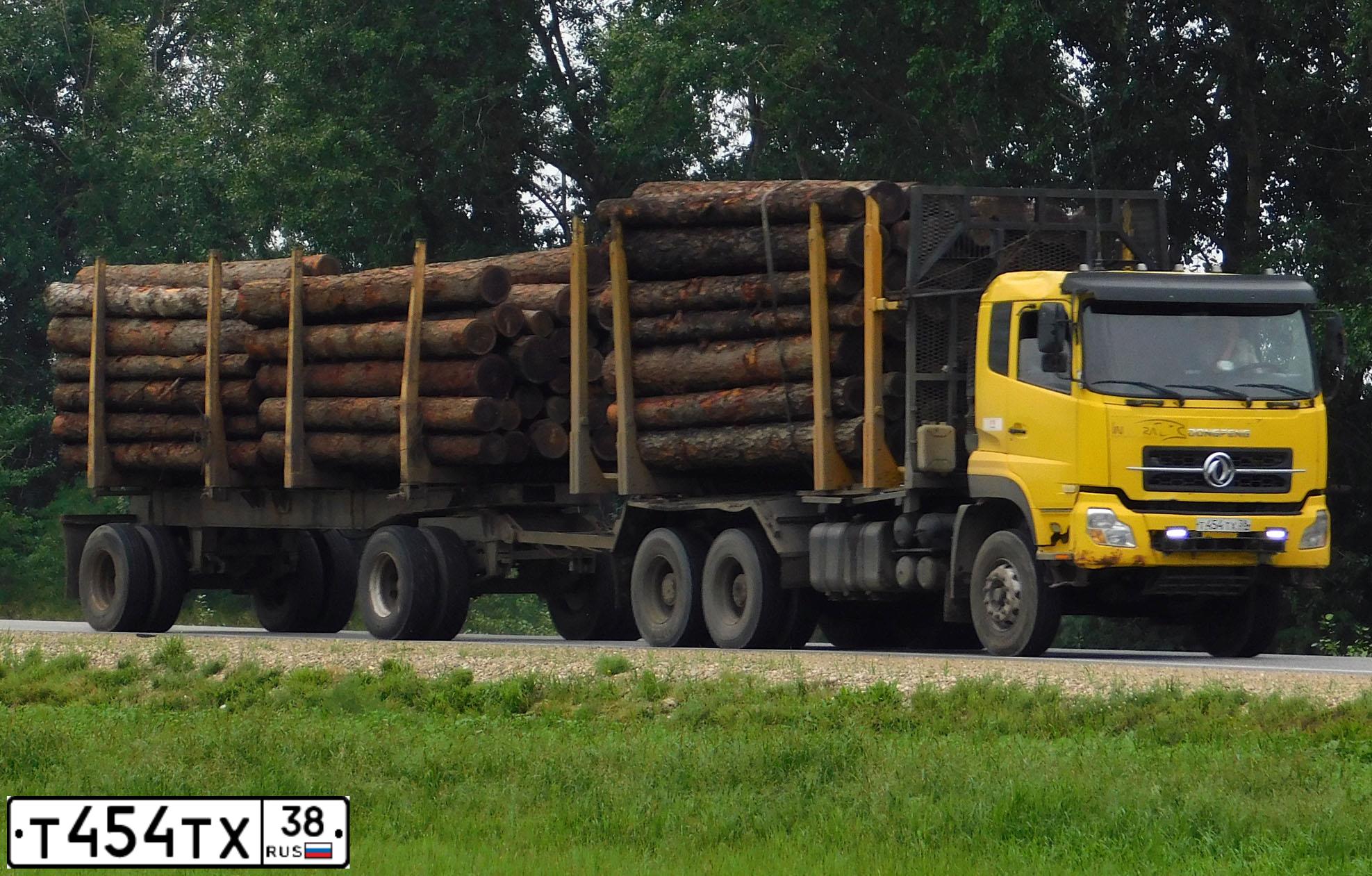 Фото автомобиля DONGFENG DFL-SERIE, 2009 — госномер Т454ТХ38. Цвет: ЖЕЛТЫЙ