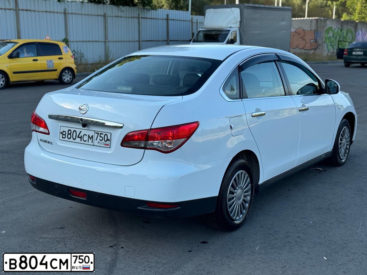 Фото автомобиля NISSAN ALMERA /AVTOVAZ/, 2018 — госномер В804СМ750. Цвет: Белый