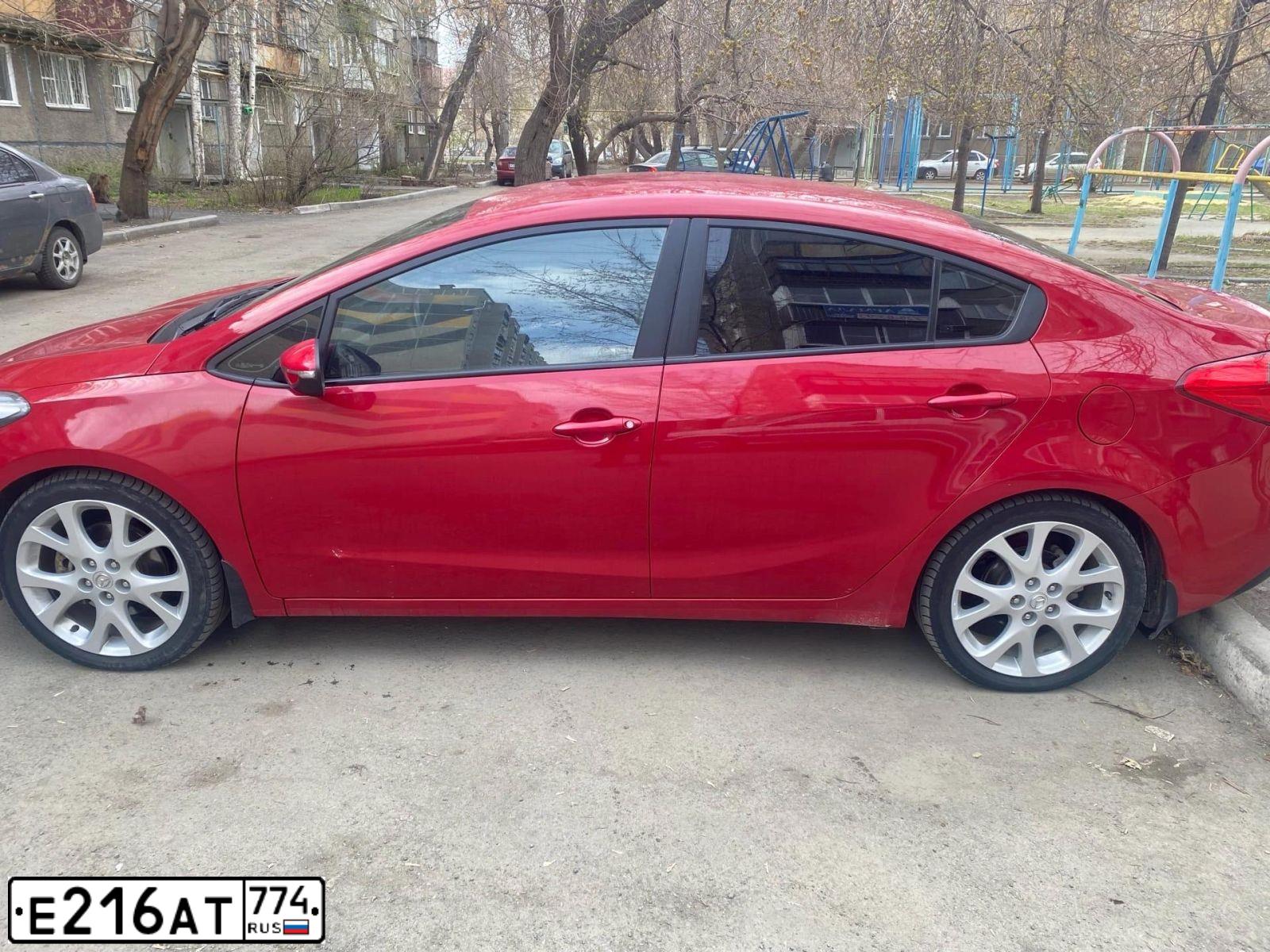 Фото автомобиля KIA CERATO, 2013 — госномер А285ОТ196. Цвет: Красный