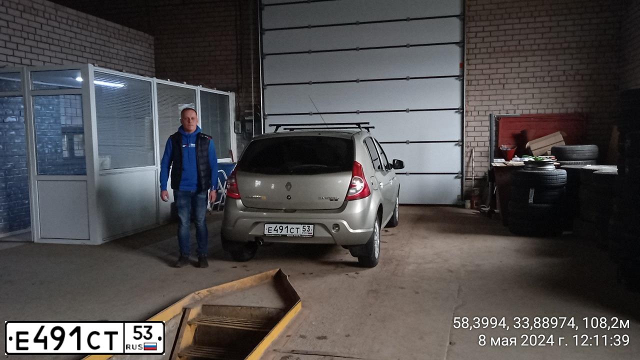 Фото автомобиля RENAULT SANDERO, 2014 — госномер К458МА53