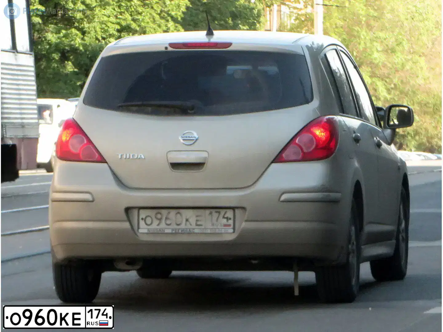 Фото автомобиля NISSAN TIIDA, 2010 — госномер Т164АЕ774