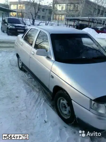 Фото автомобиля LADA 2110 LADA, 2004 — госномер М564УР152. Цвет: СВЕТЛО-СЕРЫЙ