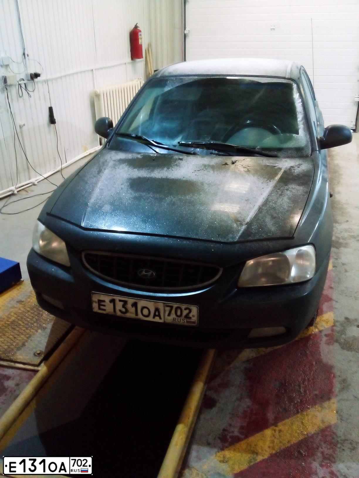 Фото автомобиля TAGAZ Z ACCENT, 2006 — госномер Е360УХ702. Цвет: ЧЕРНЫЙ