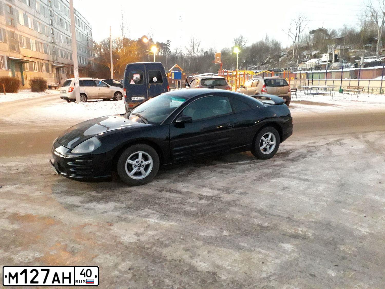 Фото автомобиля MITSUBISHI ECLIPSE, 2000 — госномер М370АК197. Цвет: ЧЕРНЫЙ