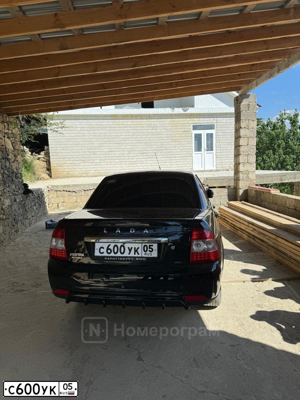 Фото автомобиля LADA VESTA, 2018 — госномер С600УК05. Цвет: ЧЕРНЫЙ