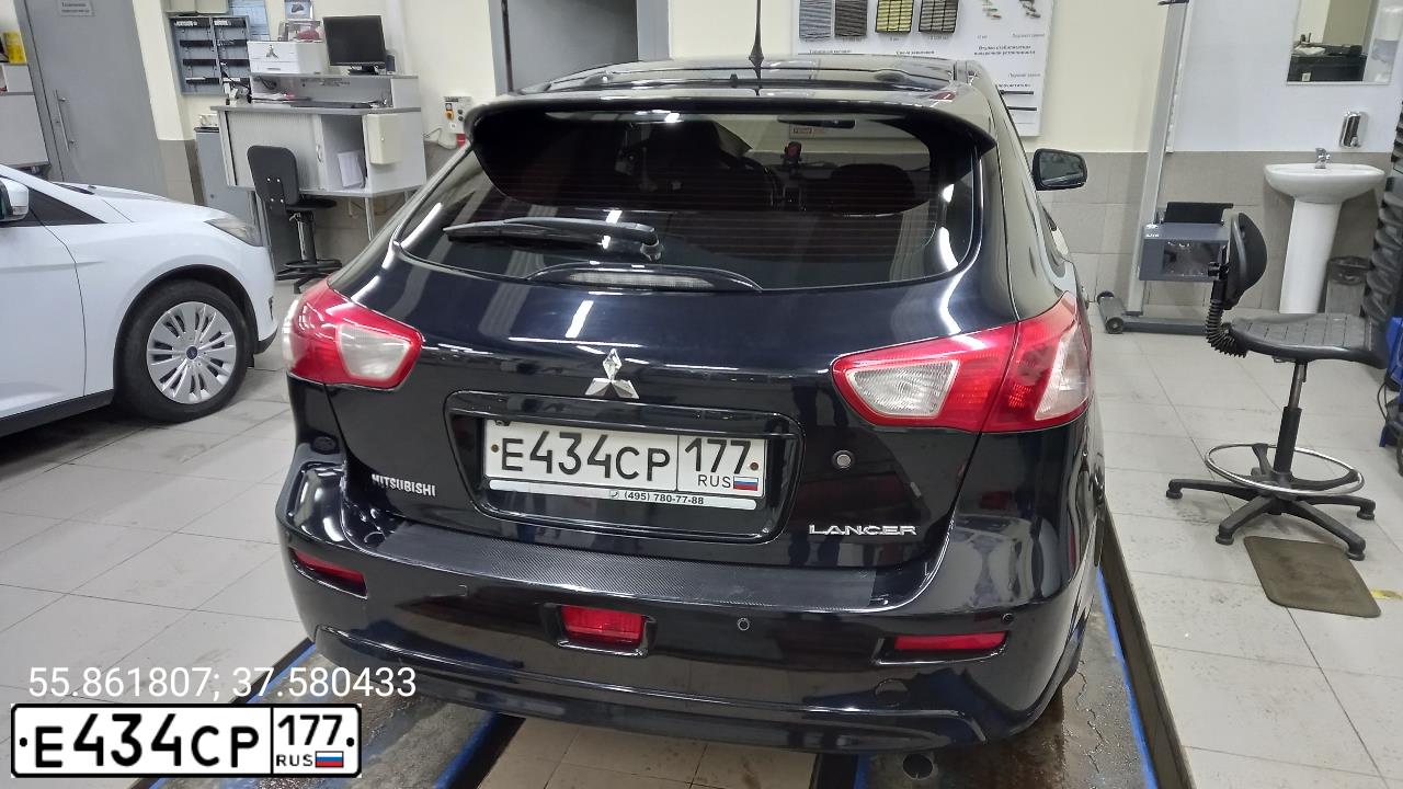 Фото автомобиля MITSUBISHI LANCER, 2008 — госномер Е434СР177. Цвет: ЧЕРНЫЙ