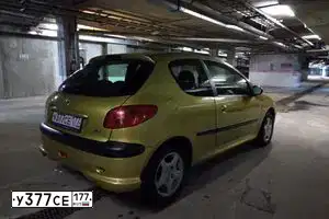Фото автомобиля PEUGEOT 206, 2005 — госномер О719УУ799. Цвет: ЗОЛОТИСТЫЙ