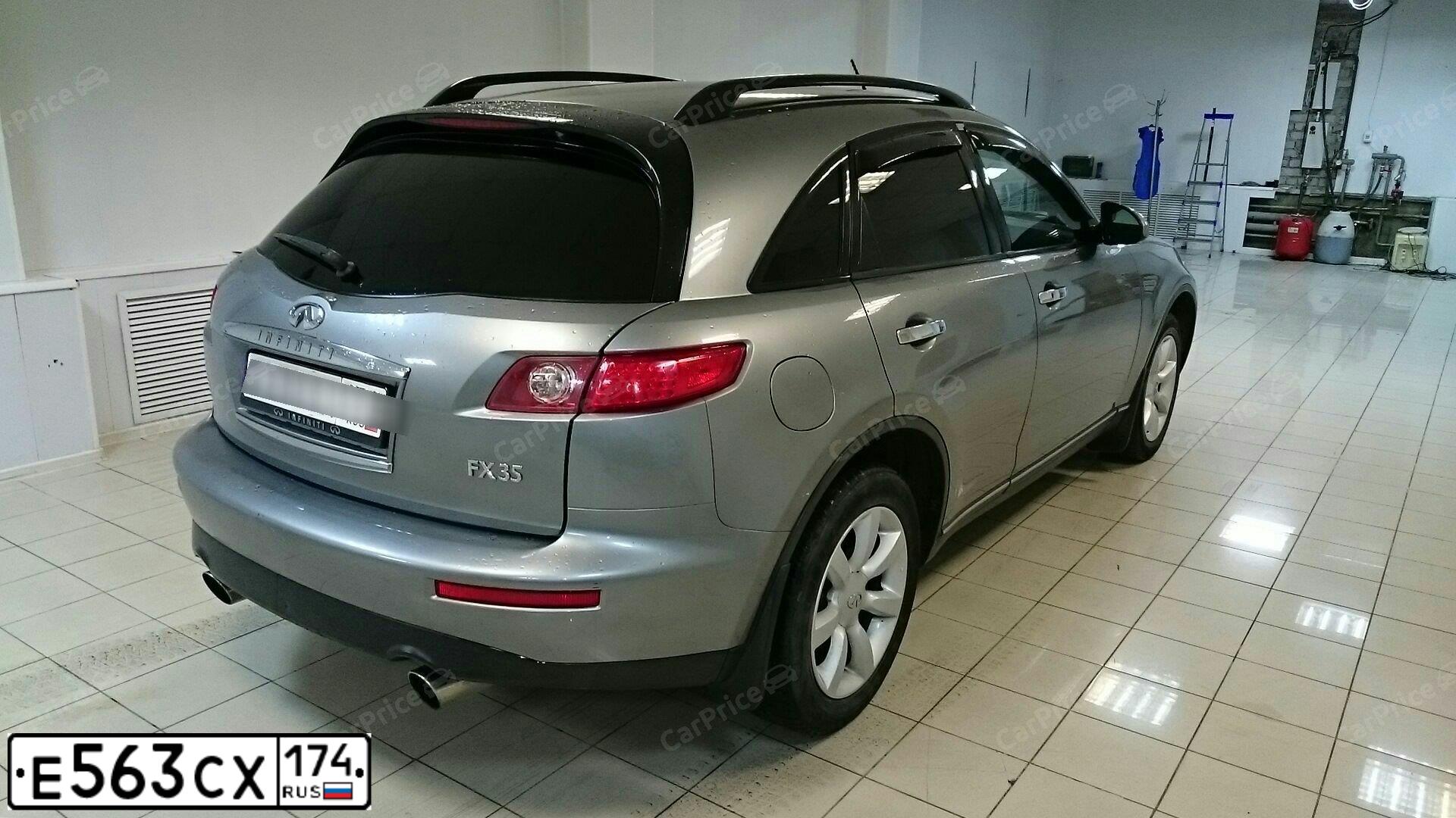 Фото автомобиля INFINITI QX70 /FX/, 2004 — госномер Е563СХ174. Цвет: СЕРЫЙ