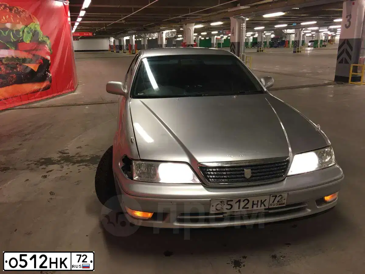 Фото автомобиля VOLKSWAGEN POLO, 2008 — госномер О512НК72. Цвет: ЯРКО-КРАСНЫЙ