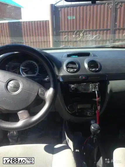 Фото автомобиля CHEVROLET LACETTI, 2005 — госномер Х288АО102. Цвет: СИНИЙ