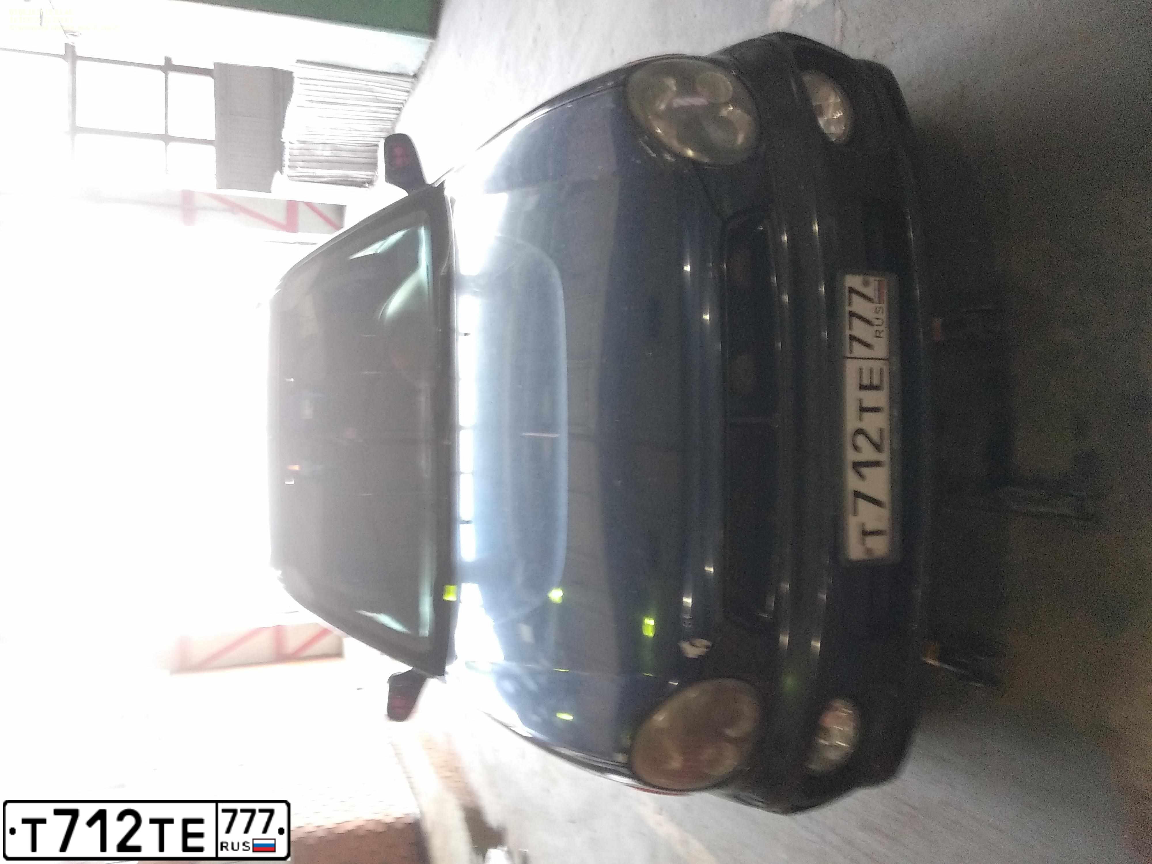 Фото автомобиля SUBARU IMPREZA, 2001 — госномер Т712ТЕ777. Цвет: СИНИЙ