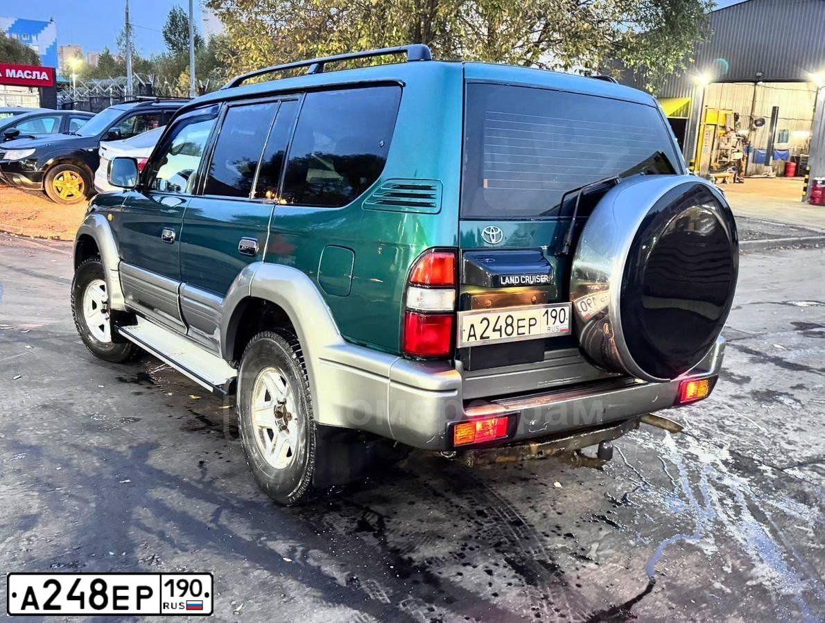 Фото автомобиля TOYOTA LAND CRUISER, 1997 — госномер С533ТА27. Цвет: ЗЕЛЕНЫЙ