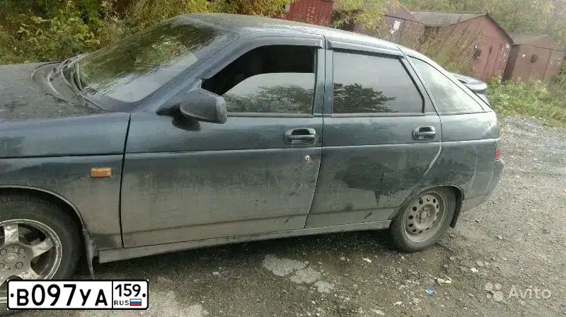 Фото автомобиля LADA 2112 LADA, 2007 — госномер В097УА159. Цвет: ТЕМНО-ЗЕЛЕНЫЙ