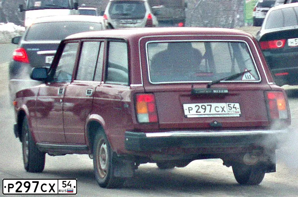 Фото автомобиля LADA 2104 LADA, 2006 — госномер Р297СХ54. Цвет: КРАСНЫЙ ПОРТУ