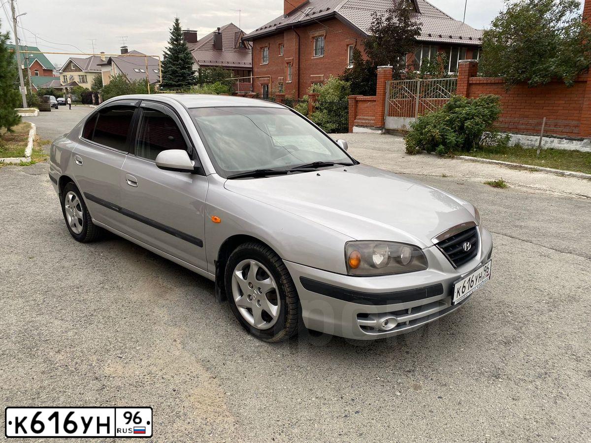 Фото автомобиля HYUNDAI ELANTRA, 2006 — госномер Н319НТ790. Цвет: СВЕТЛО-СЕРЫЙ