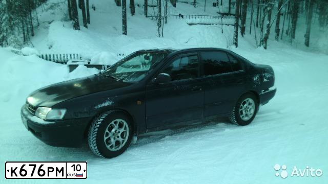 Фото автомобиля TOYOTA CARINA, 1994 — госномер К676РМ10. Цвет: сине-зеленый