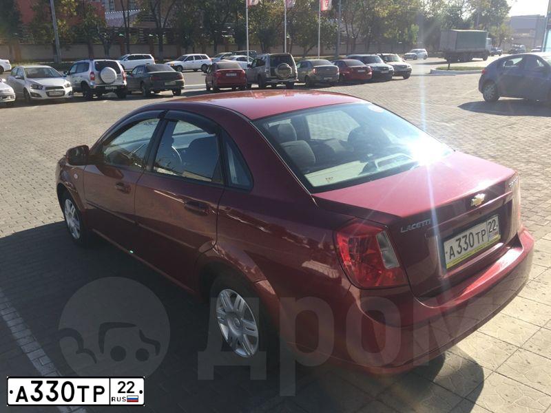 Фото автомобиля CHEVROLET LACETTI, 2011 — госномер А330ТР22. Цвет: КРАСНЫЙ