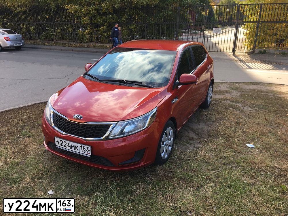 Фото автомобиля KIA RIO, 2014 — госномер К197КА164. Цвет: Красный