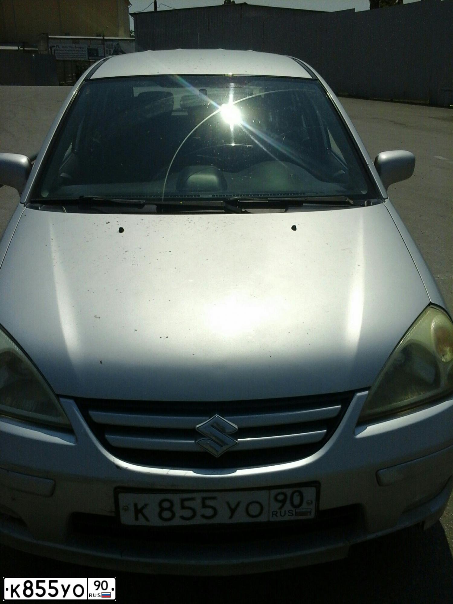 Фото автомобиля SUZUKI LIANA, 2005 — госномер К855УО90. Цвет: Серебристый