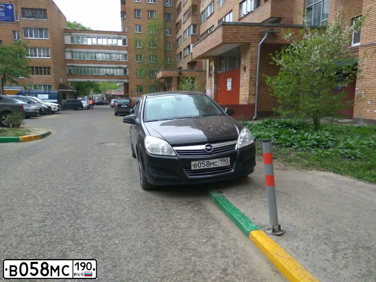 Фото автомобиля OPEL ASTRA, 2010 — госномер В058МС190. Цвет: СЕРЫЙ ТЕМНЫЙ