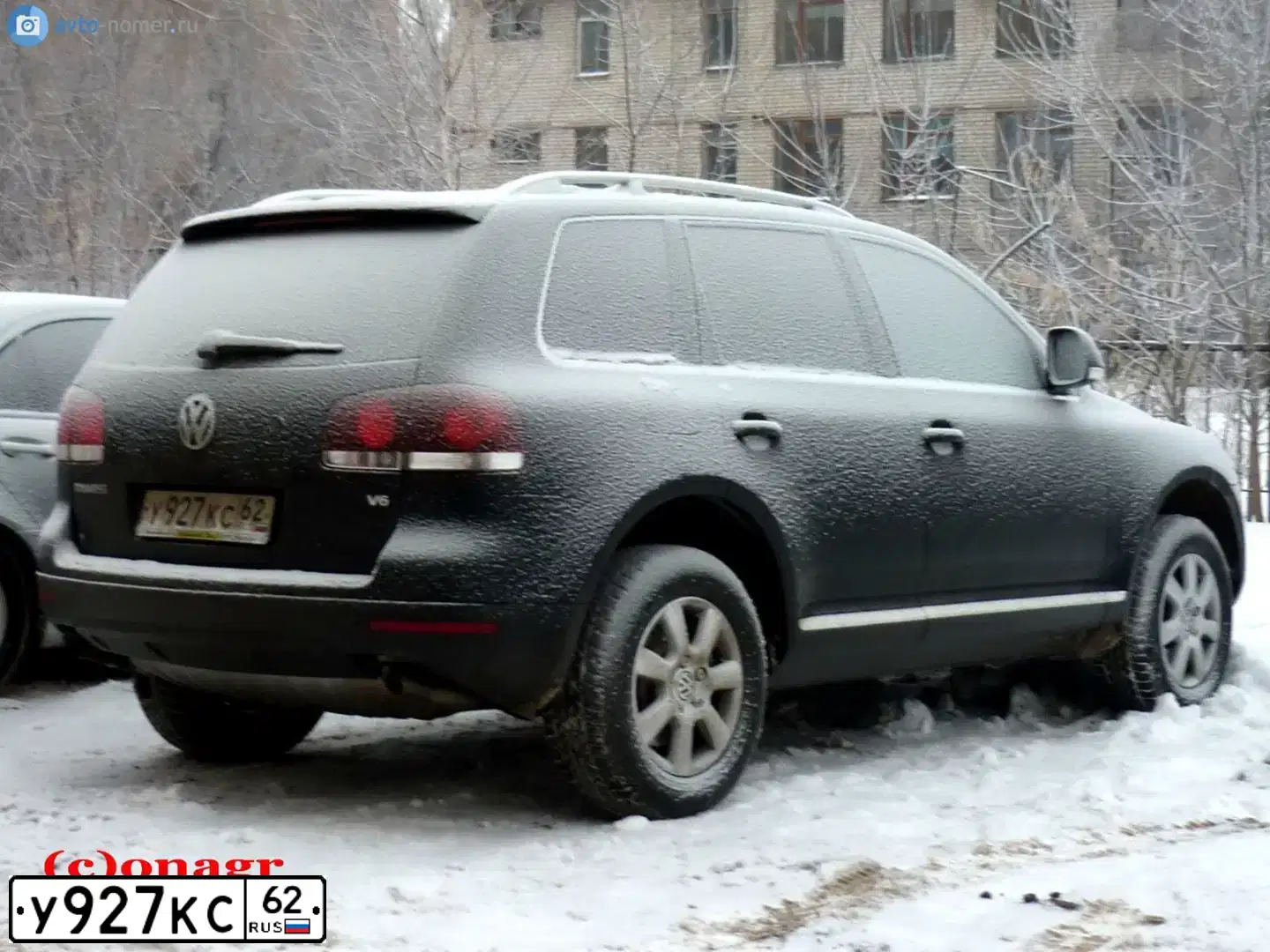 Фото автомобиля VOLKSWAGEN TOUAREG, 2007 — госномер Н660МХ761. Цвет: ЧЕРНЫЙ
