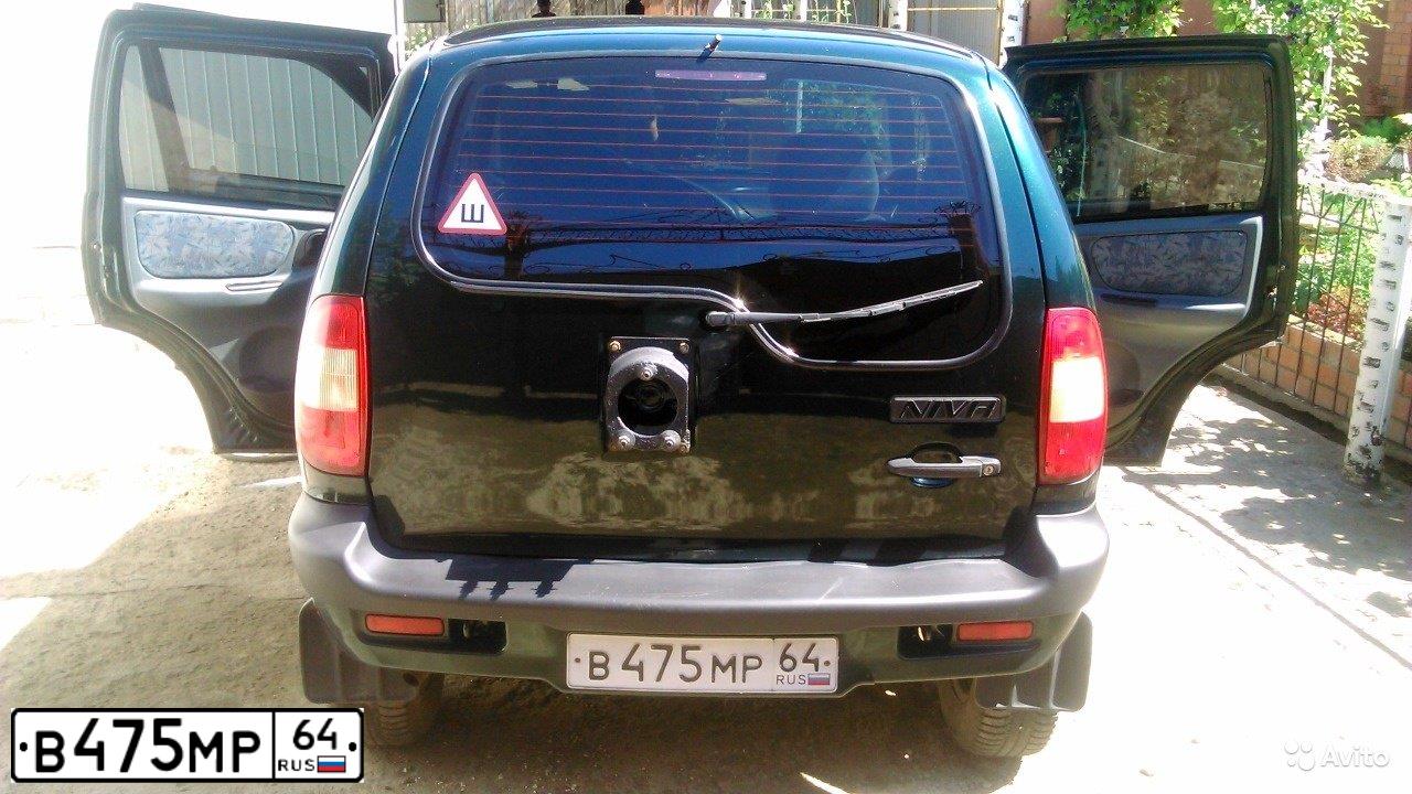 Фото автомобиля CHEVROLET NIVA, 2004 — госномер В475МР64. Цвет: ТЕМНО ЗЕЛЕНЫЙ