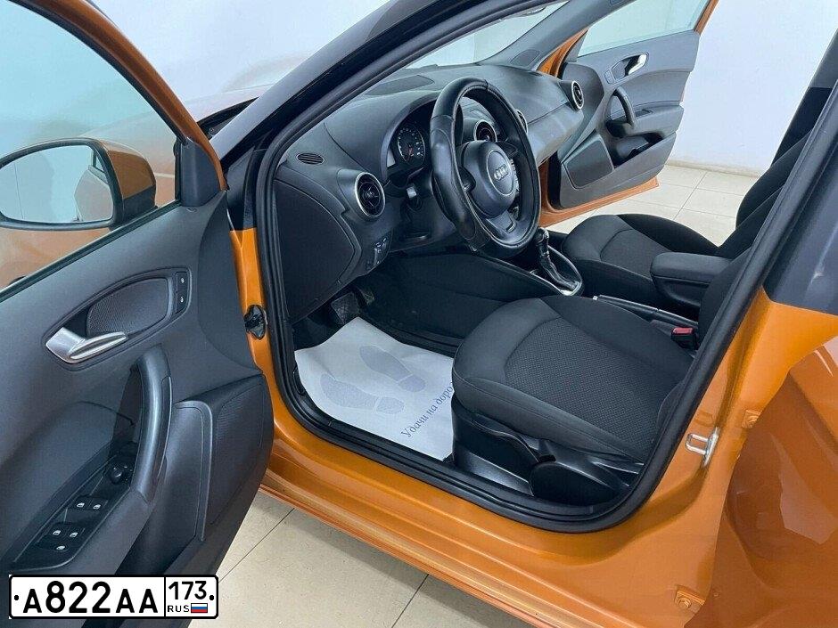 Фото автомобиля AUDI A1 SPORTBACK, 2013 — госномер Т141ОТ790. Цвет: Оранжевый
