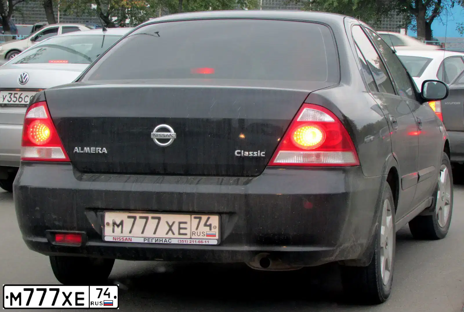 Фото автомобиля NISSAN ALMERA, 2012 — госномер В104АХ774. Цвет: ЧЕРНЫЙ