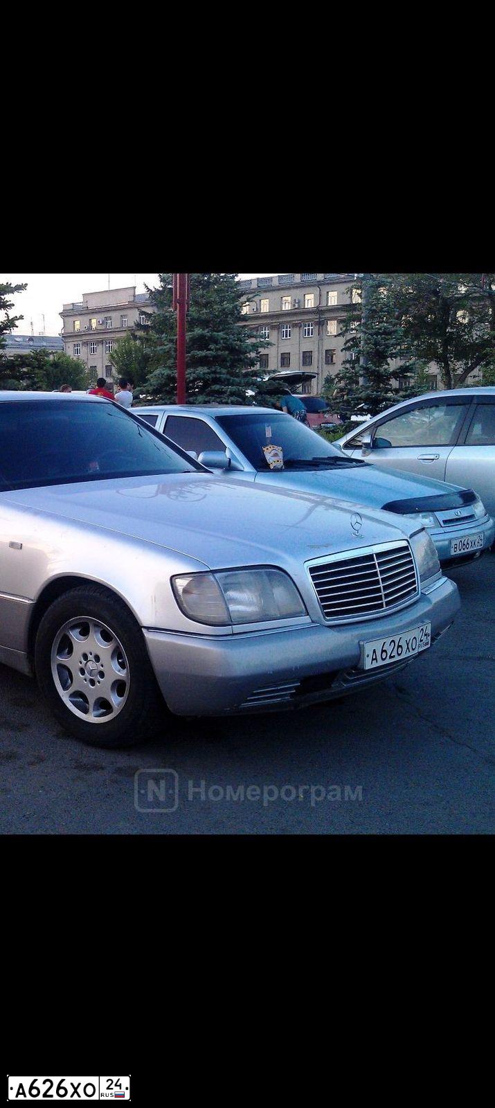 Фото автомобиля МЕRСЕDЕSВЕNZ500SЕ, 1992 — госномер О400ОО77. Цвет: СЕРЫЙ