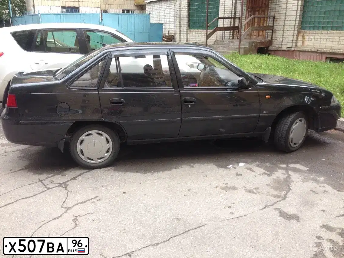 Фото автомобиля DAEWOO NEXIA, 2012 — госномер Х507ВА96. Цвет: Бледно-Черный