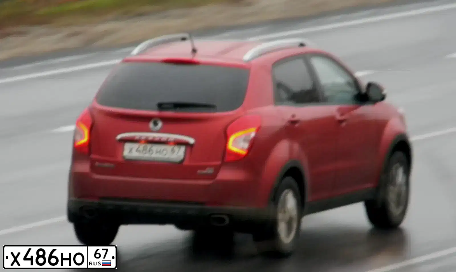 Фото автомобиля SSANGYONG ACTYON, 2014 — госномер Х486НО67. Цвет: КРАСНЫЙ
