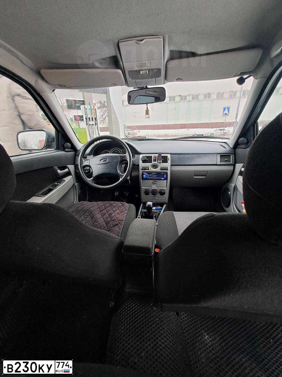 Фото автомобиля LADA 2172 PRIORA, 2010 — госномер В230КУ774. Цвет: СРЕДНИЙ СЕРО-ЗЕЛЕНЫЙ МЕТ.