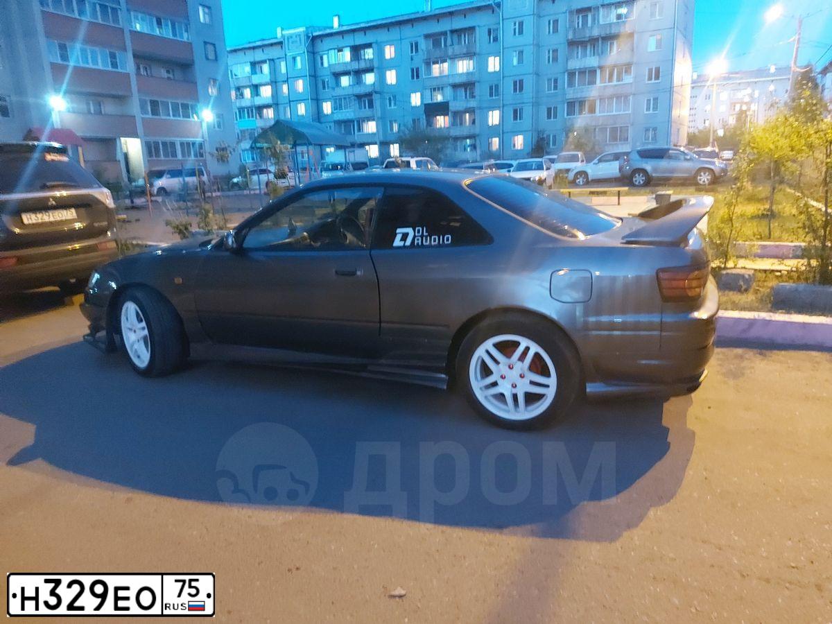 Фото автомобиля MITSUBISHI OUTLANDER, 2014 — госномер В004КО777. Цвет: ЧЕРНЫЙ