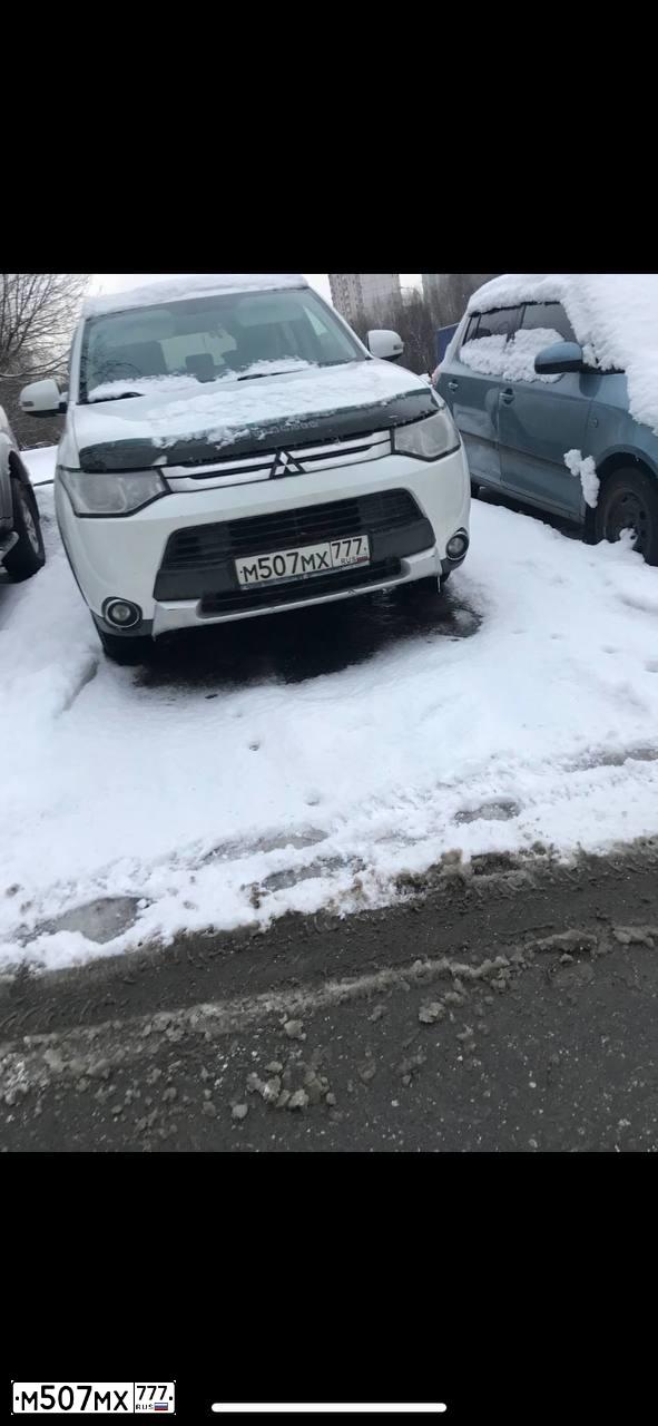 Фото автомобиля MITSUBISHI OUTLANDER, 2014 — госномер М507МХ777. Цвет: БЕЛЫЙ