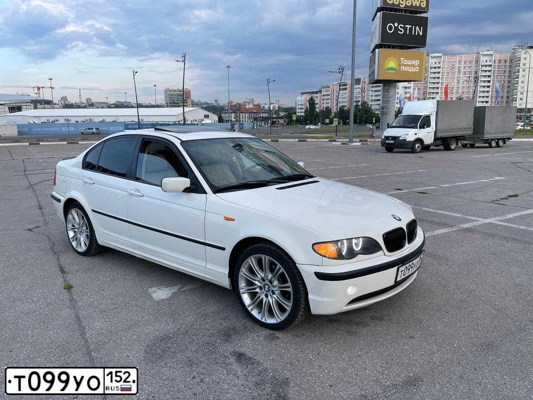 Фото автомобиля BMW 325XI, 2004 — госномер Н385ТС702. Цвет: Белый