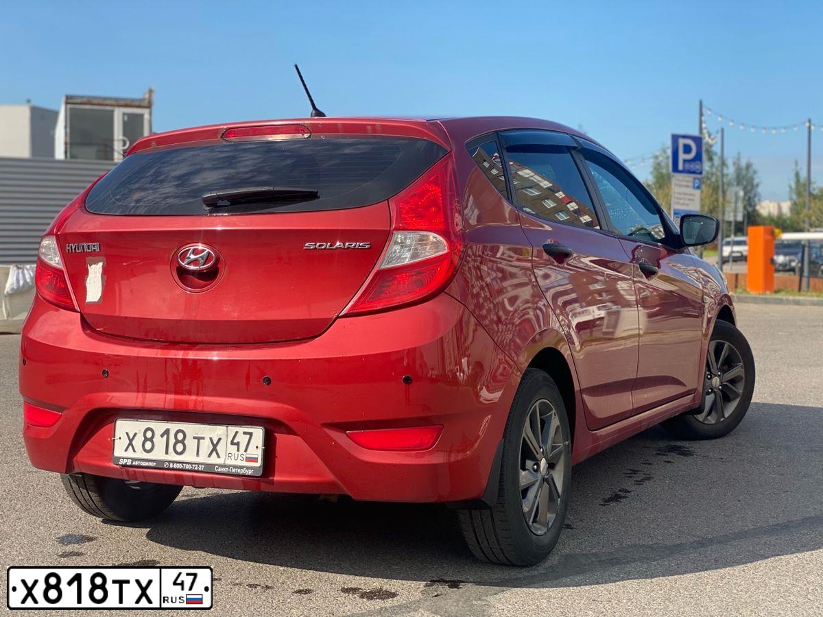 Фото автомобиля HYUNDAI SOLARIS, 2014 — госномер Х818ТХ47. Цвет: КРАСНЫЙ ГРАНАТ
