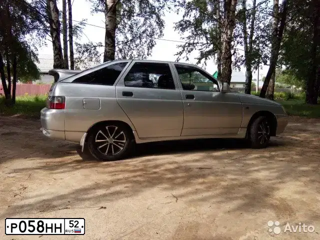 Фото автомобиля LADA 2112 LADA, 2005 — госномер Р058НН52. Цвет: СВЕТЛО-СЕРЕБРИСТЫЙ  МЕТАЛЛИК