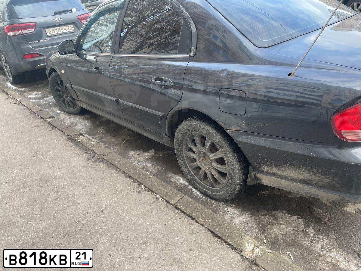 Фото автомобиля KIA CERATO, 2011 — госномер В818КВ21. Цвет: ЧЕРНЫЙ
