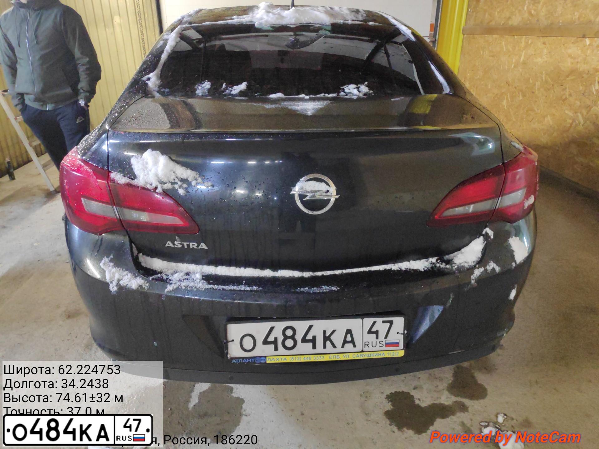 Фото автомобиля OPEL ASTRA, 2014 — госномер Н374КО10. Цвет: ЧЕРНЫЙ МЕТАЛЛИК