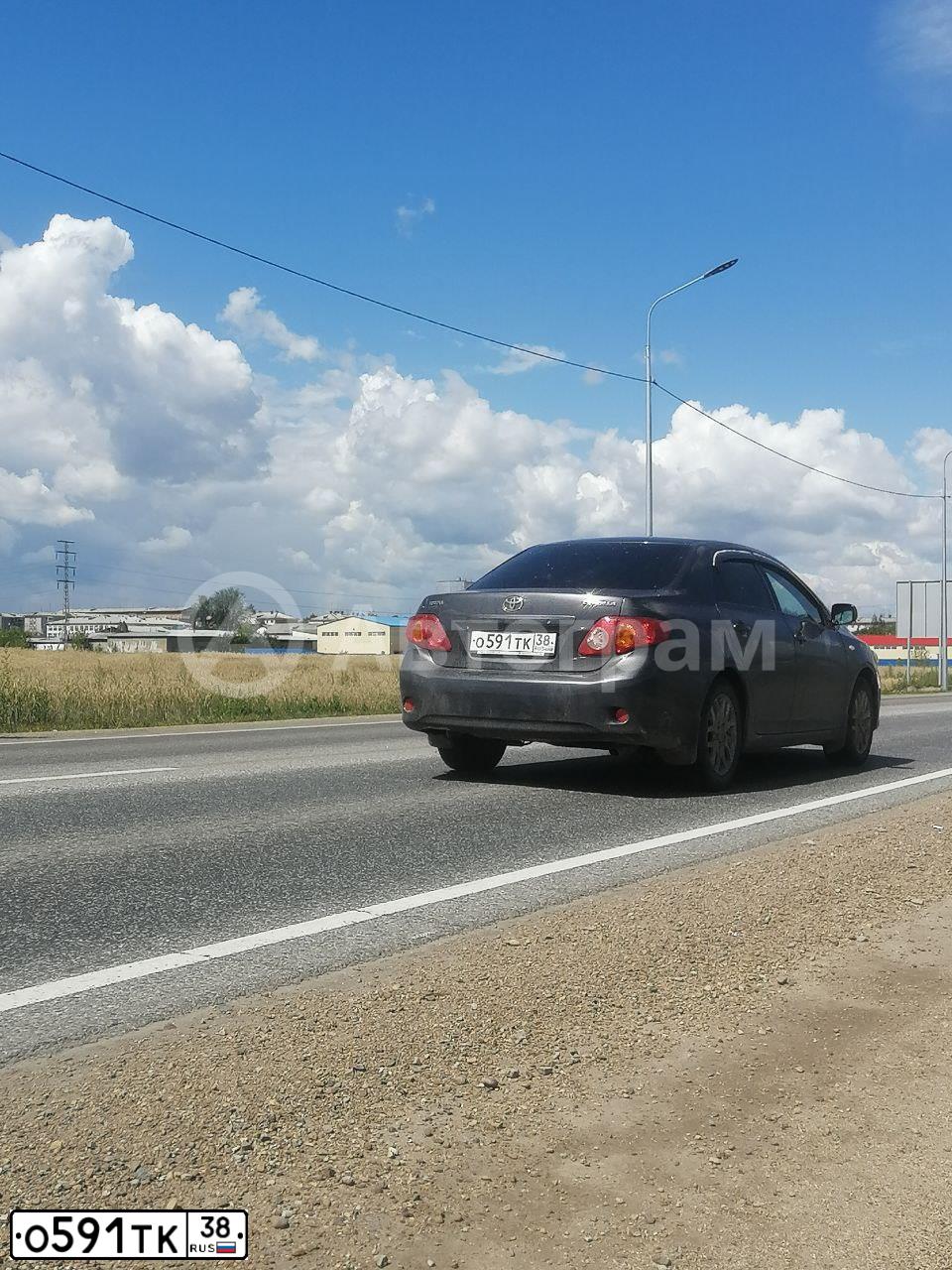 Фото автомобиля TOYOTA COROLLA, 2008 — госномер О591ТК38. Цвет: СЕРЫЙ